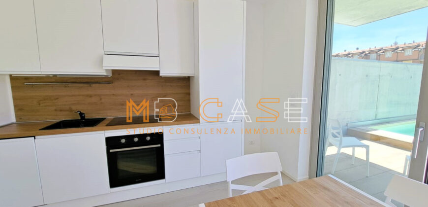 PRESTIGIOSO TRILOCALE DUPLEX NUOVO ARREDATO con PISCINA