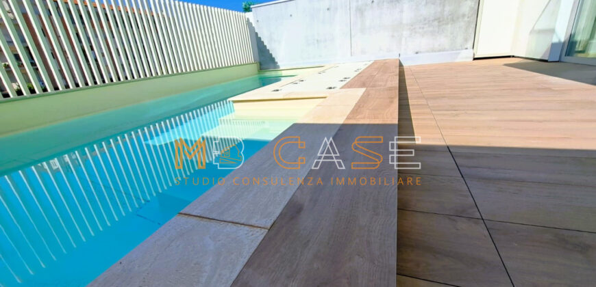 PRESTIGIOSO TRILOCALE DUPLEX NUOVO con PISCINA