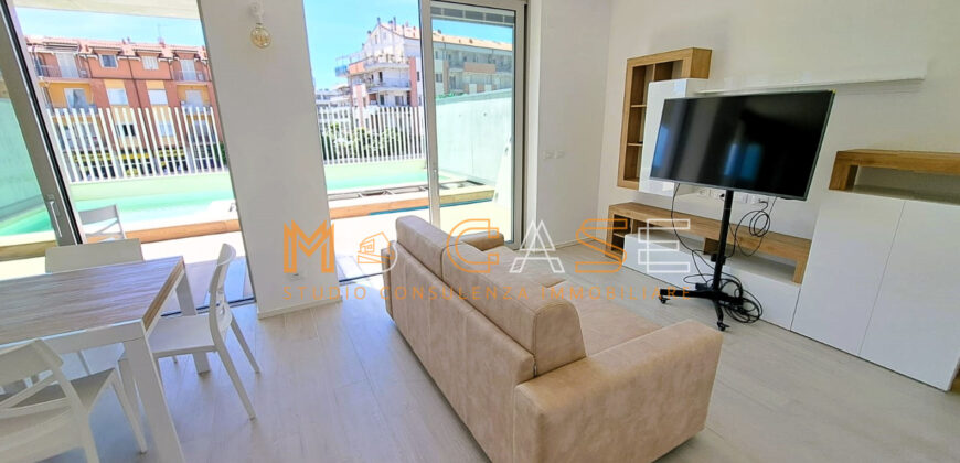 PRESTIGIOSO TRILOCALE DUPLEX NUOVO ARREDATO con PISCINA